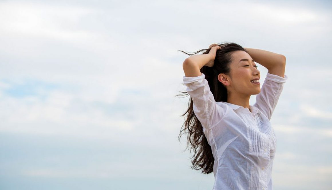 The Benefits of Intramuscular B12 and Vitamin Shots for Optimizing Health and Energy - woman feeling good