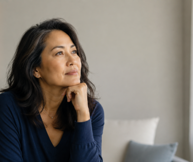 Asian woman hand on chin thinking